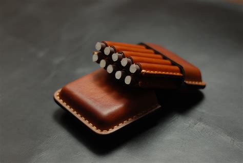A vintage black leather <b>cigar</b> <b>case</b> is the perfect for those wishing to carry up to 4 cigars with them at all times. . Cigarillo case